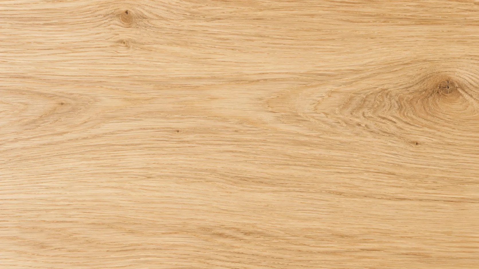 Gros plan sur le veinage naturel d'un bois clair